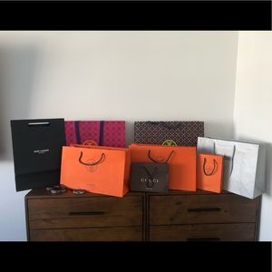 Hermes, Tory Burch, Saint Laurent, Gucci, NM shopping paper bags + Hermes Bands.